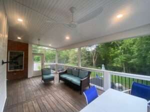 photo of interior of white deck against brick home _preferred construction_deck remodeling knoxville