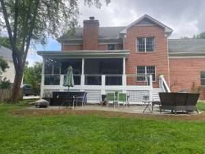 photo of white deck against brick home _preferred construction_deck remodeling knoxville