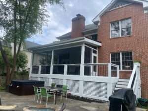 photo of white deck against brick home _preferred construction_deck remodeling knoxville