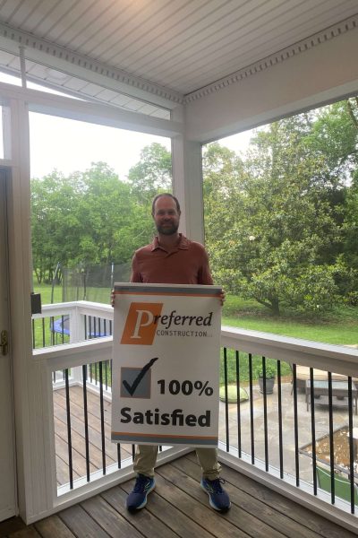 photo of 100% satisfied customer standing on _preferred construction_deck remodeling knoxville